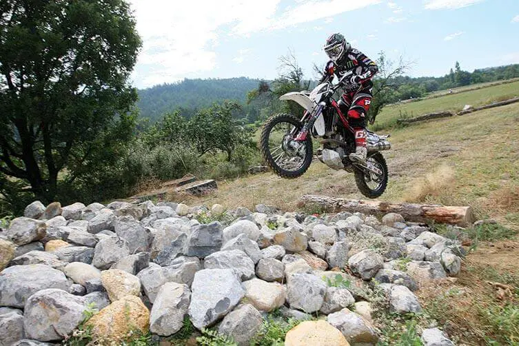 how to ride a dirt bike over rocks