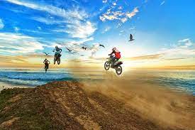 Tips for riding a dirt bike in the sand 
