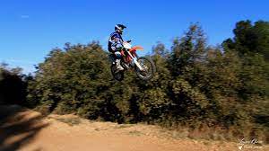 Go for the big jump on a dirt bike